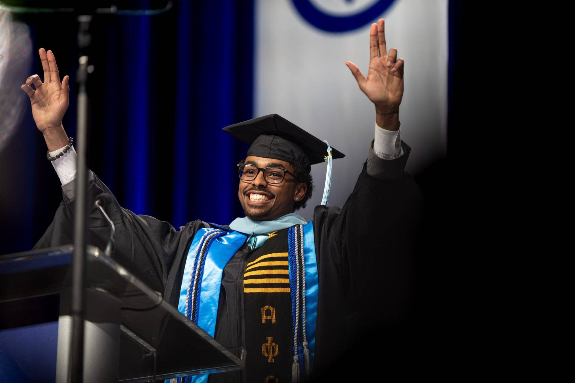 A student Commencement speaker addresses the crowd.
